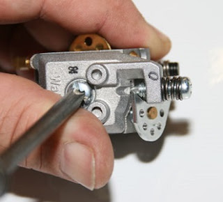 A typical Walbro 2-cycle engine carburetor, thumbnail for scale