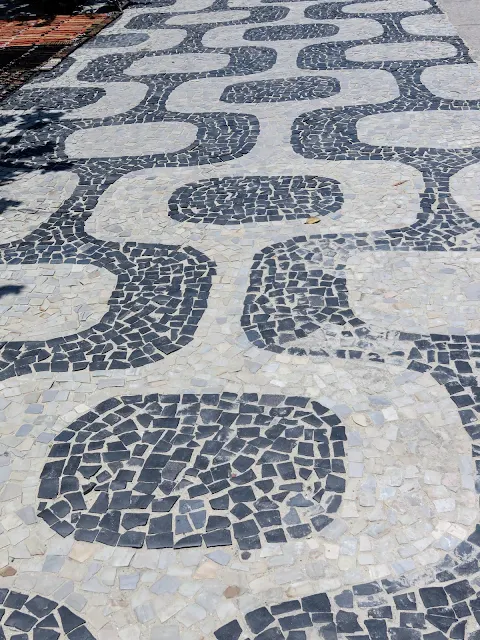 Black and white mosaic tiles along Ipanema Beach in Rio de Janeiro Brazil