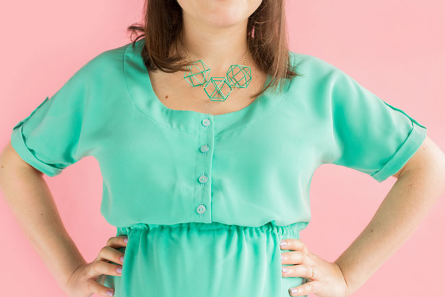 Close up on button-front opening of green Bettine maternity dress