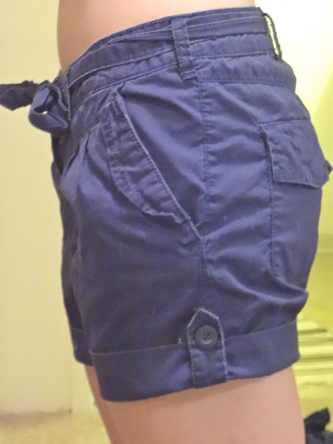 dark blue shorts with waist tie and pocket flaps, from salvation army vancouver