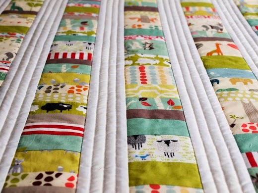 Close view of custom organic cotton baby quilt by Organic Quilt Company