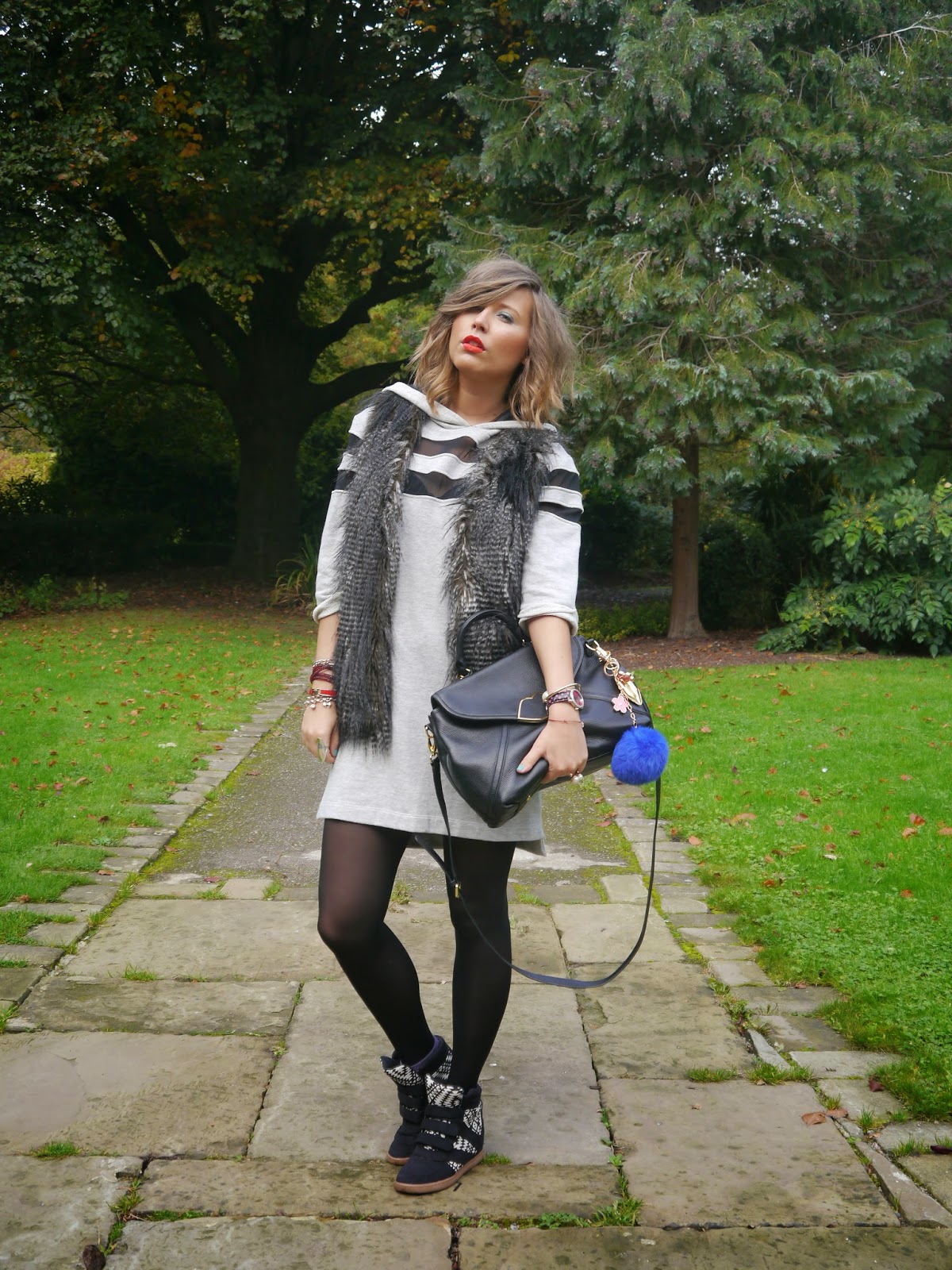 Layering with Fur gilet and Lulu Guinness Lips satchel