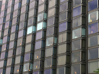 Square curtain walls of a hotel in purple shade