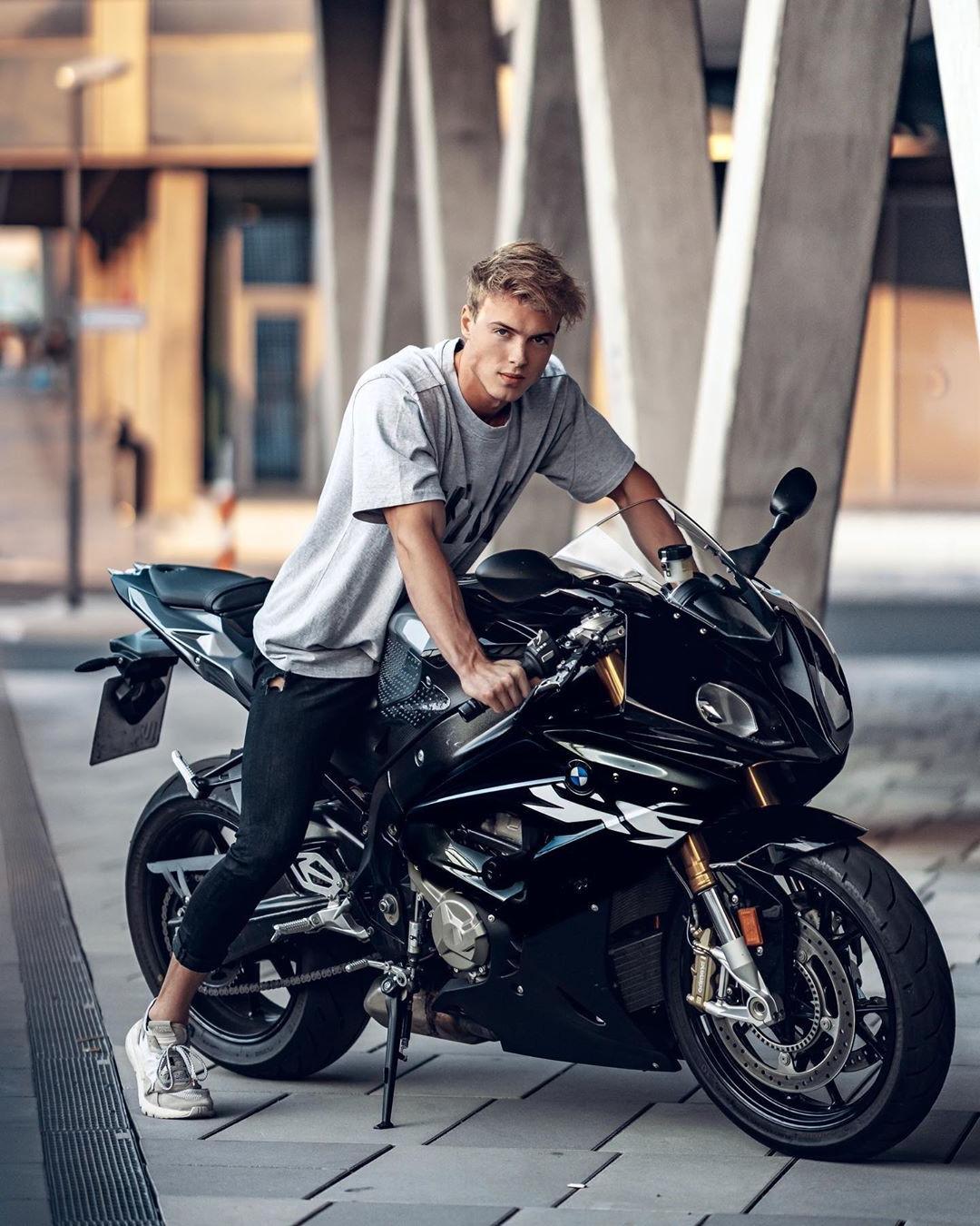 cute-blond-american-college-bro-perfect-jawline-sitting-cool-black-motorcycle