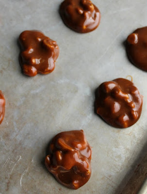 caramel and cashew mounds ready to be dipped in chocolate