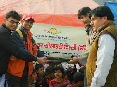 Distribution of Clothes to the Migrants of J&K