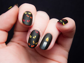 Spooky eyes nail art by @chalkboardnails