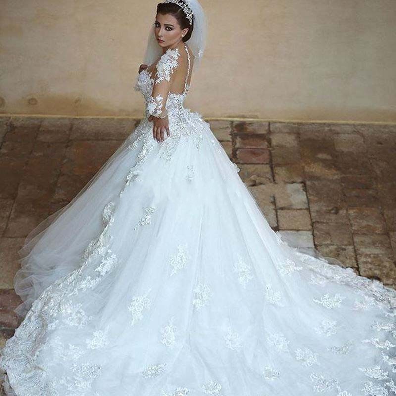 Wedding dresses with long sleeves and long trains