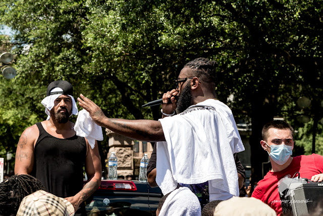 Strong speeches were made in blistering heat.