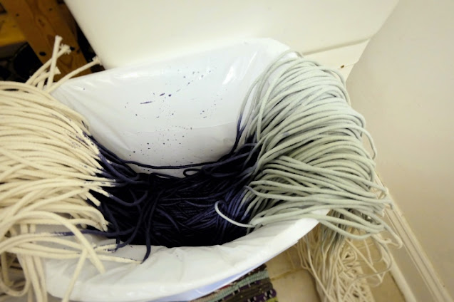 dyeing cotton string in laundry tub