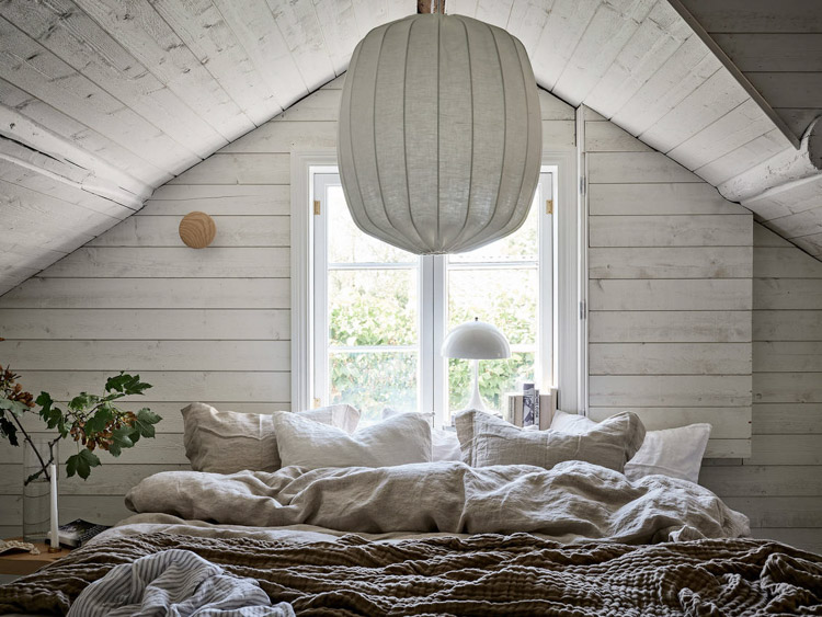 An Idyllic Blue and White Swedish Cottage In The Countryside