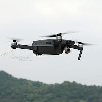 DJI Mavic Pro Flying in air side View DJI Mavic Pro Flying in air side View