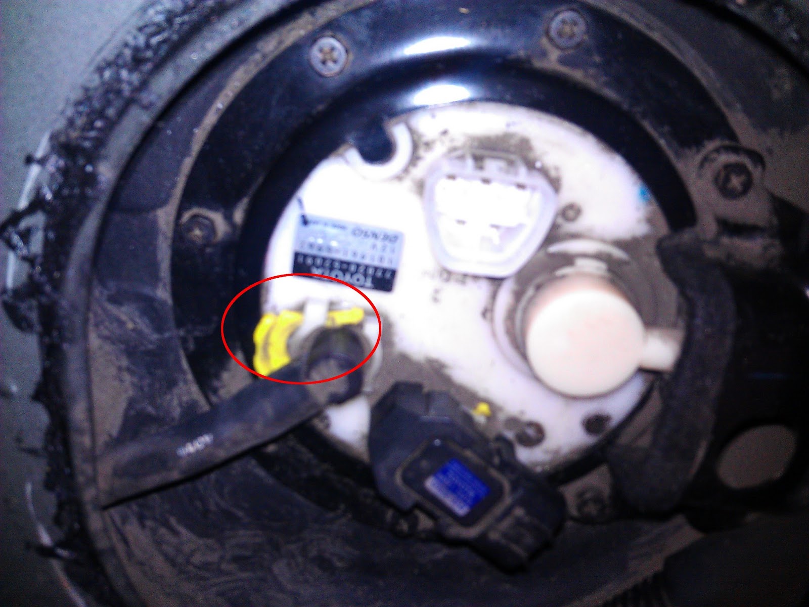 Unscrew the bolts (all of them). two of the bolts hold down the intake valve cover piece.