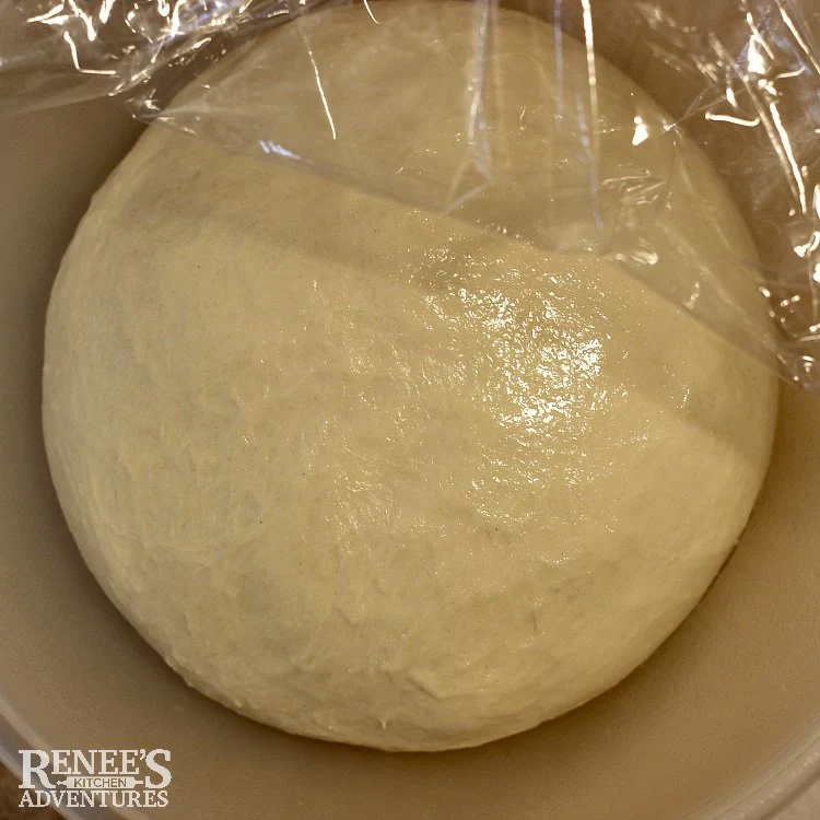 First rise of soft white bread recipe, ready to be punched down and formed into a loaf