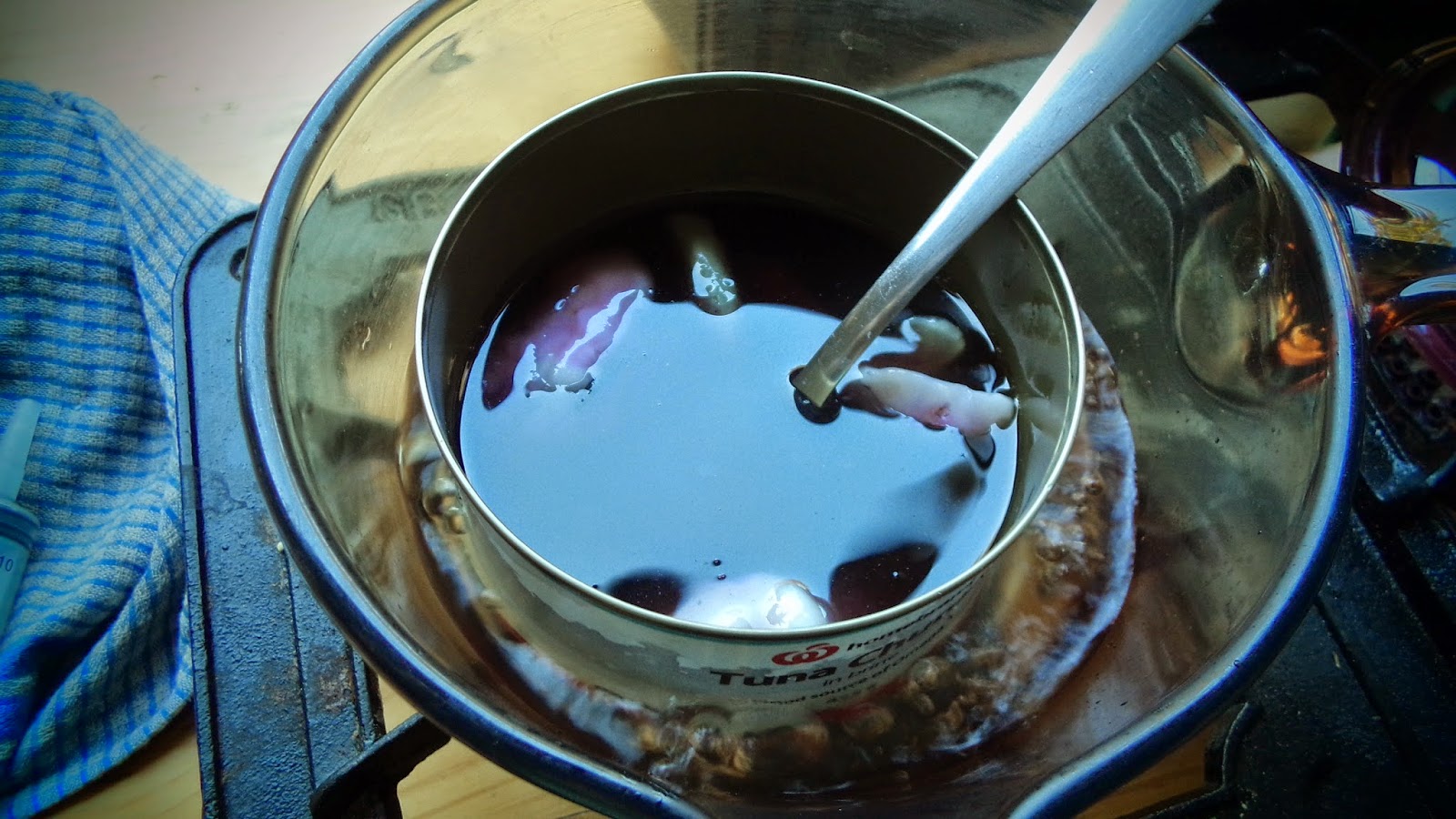 Refilling old candle holders with new home made candles!