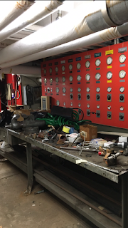 Workbench in the basemement before it was cleaned and organized