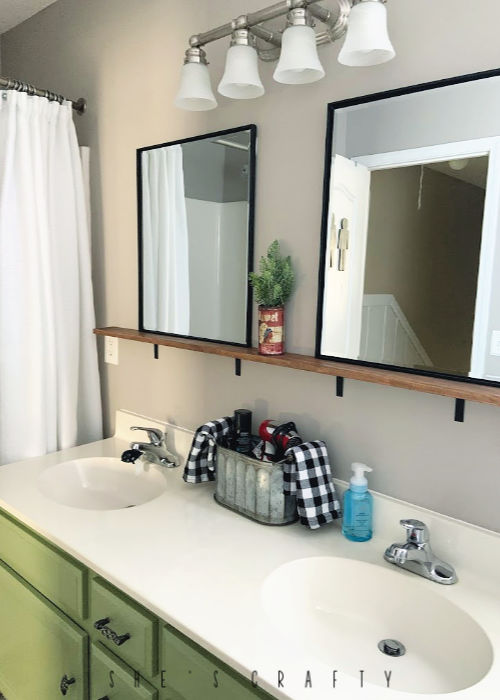 Bathroom Makeover on a budget  |  paint bathroom cabinets Brisk Olive by Valspar, paint walls with leftover paint, make shelf to hold mirrors, shelf above vanity