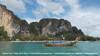 Longtail boat in front of cliffs  - Ao Nang to Railay trip