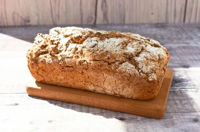Loaf of Wholemeal Beer Bread on a Wooden Board