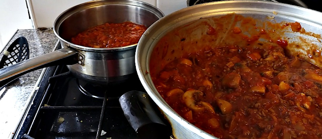 2 pans of spaghetti bolognese.