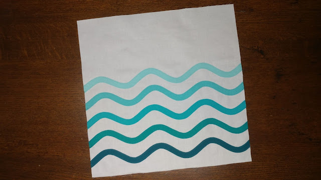 Ocean waves quilt block using raw-edge applique