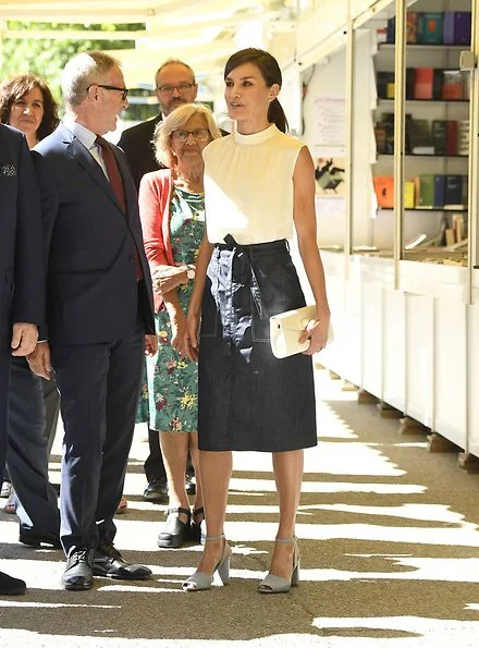 Queen Letizia wore Hugo Boss Exina sleeveless top, and the queen wore Hugo boss denim skirt jeans