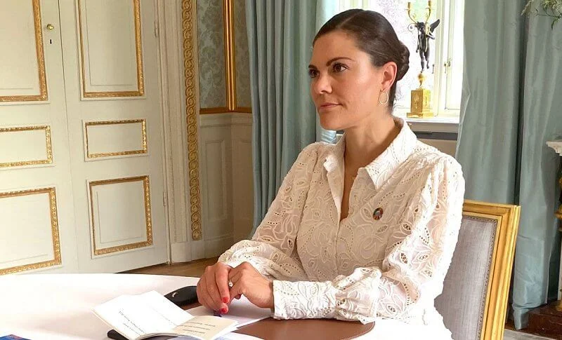 Crown Princess Victoria wore a libby shirt dress from Valerie Stockholm, and a blue Mosaic-patterned silk dress from H&M