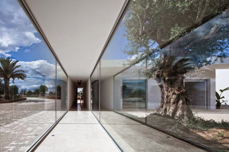 large glass windows design Modern House with Pool in Tavira