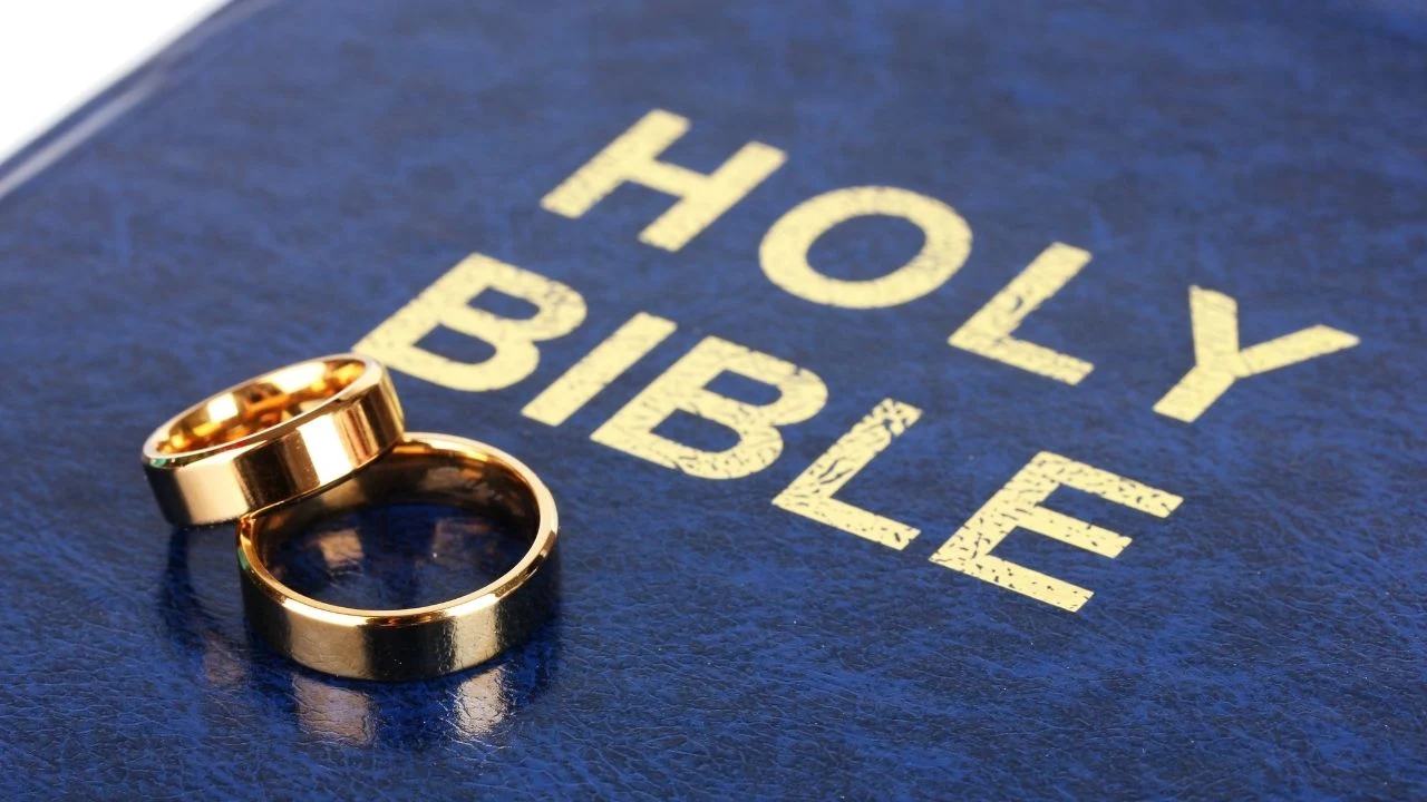 Wedding rings on holy bible.