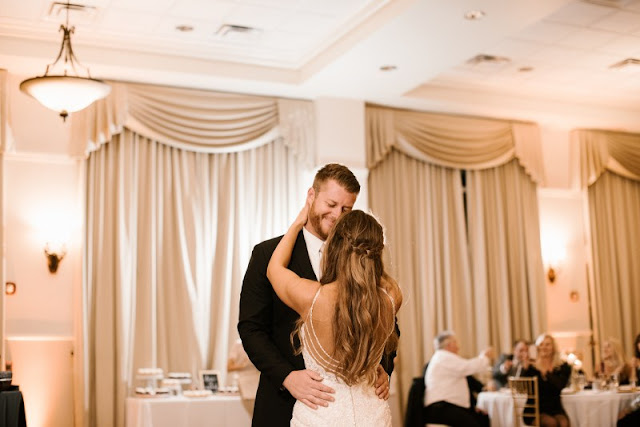 groom smiling during first dance