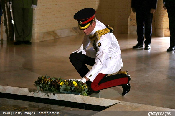 Prince Harry lays a wreath at the Tomb of the Unknown Soldier at the Australian War Memorial on April 6, 2015 in Canberra, Australia.