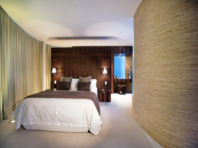 Modern bedroom with curved walls