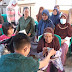  PT Pos Cabang Banyuresmi, Distribusikan Beras 10 Kg ke 98 KPM di Kampung Cibunuang