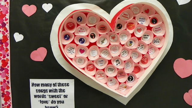 Valentine's Day bulletin board for any classroom.  Use cupcake papers to make a giant, heart-shaped "candy" box.