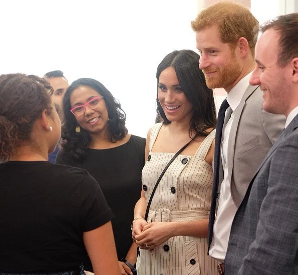 Meghan Markle wore Altuzarra Audrey button detailed ottoman midi dress, Camilla And Marc Marguerite blazer, carried Oroton Avalon Zip Top Crossbody