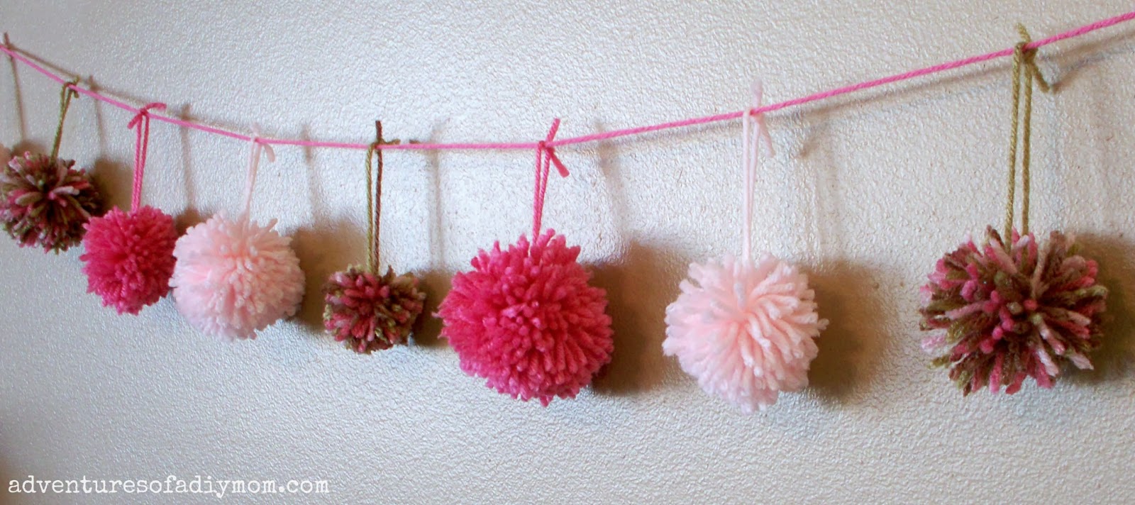 How to Make Yarn Pom Poms Adventures of a DIY Mom