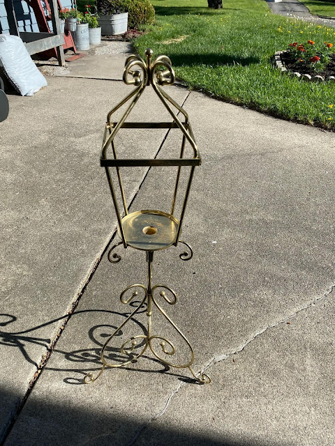 Photo of a gold metal candleholder