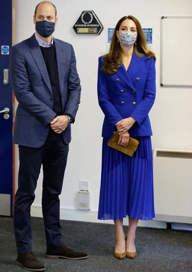 Kate Middleton wore a cobalt tailored double breasted blazer from Zara, and cobalt blue pleated midi skirt from Zara