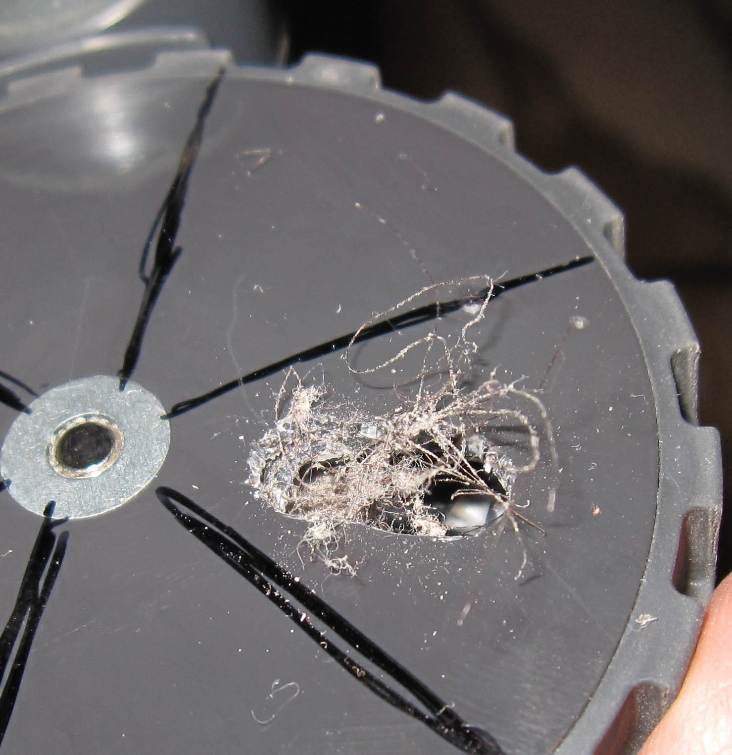 Tech for Passion Teardown Roomba wheel assembly taken apart Hair/debris cleaning Roomba