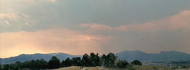 Rocky Mountains forest fires burning bad air quality Denver coughing allergies Covid