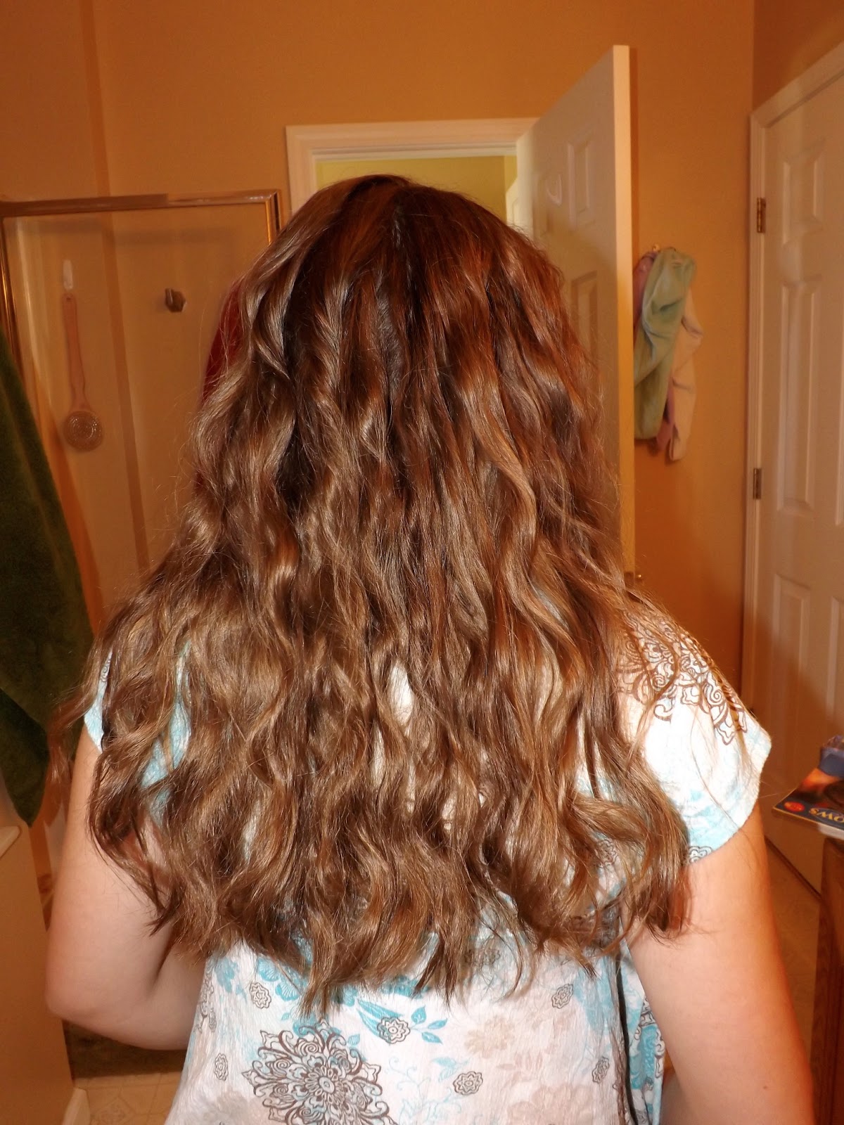 Curly Hair and Dangly Earrings