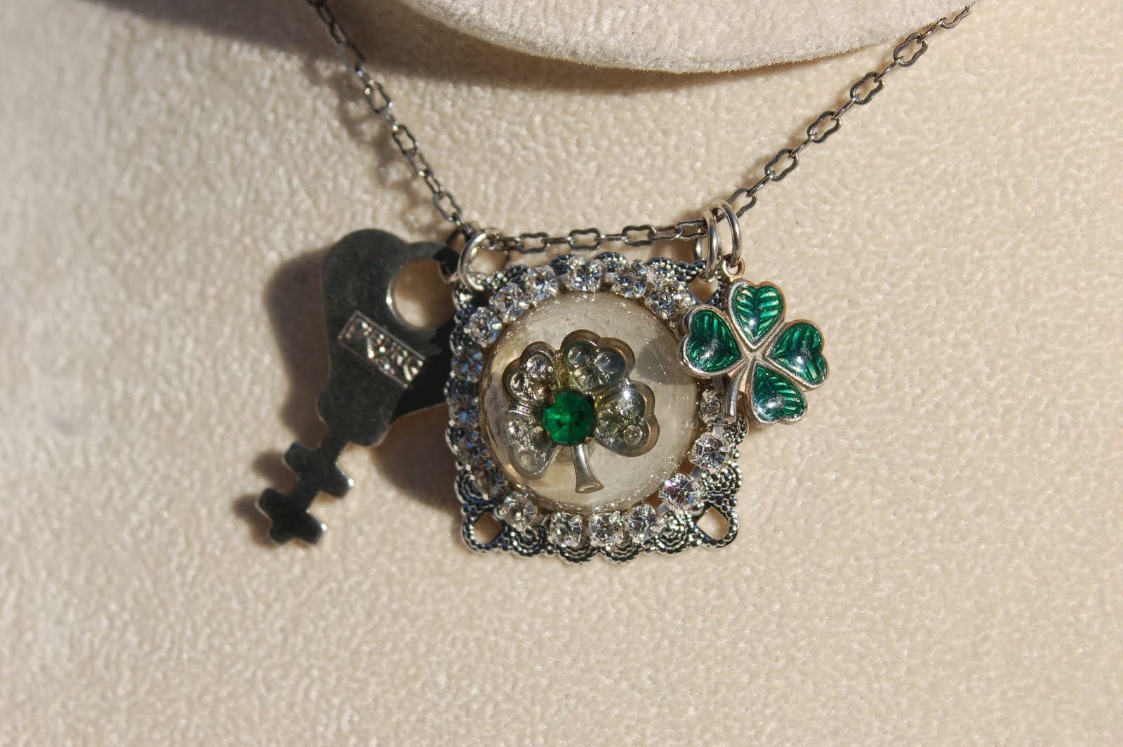 Necklace with clover earring cast in resin
