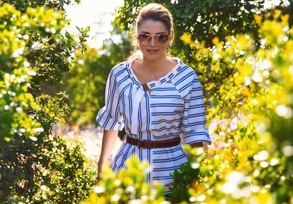 Queen Rania wore a new tie neck sleeve top by Tibi. The Queen visited Reef Spring Resorts in Ajloun, and met with Sawwah tourism platform