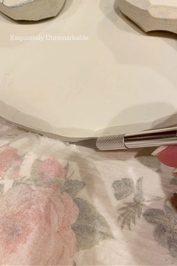 Using Exacto Knife To Cut Napkin