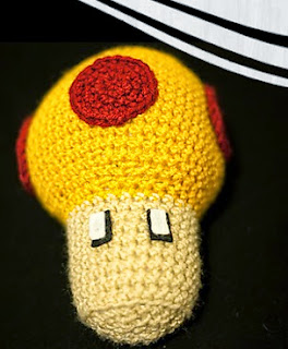 http://www.craftsy.com/pattern/crocheting/toy/amigurumi-mario-mushroom-toy/87374