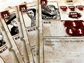 A selection of character cards from The Walking Dead: All Out War miniatures game