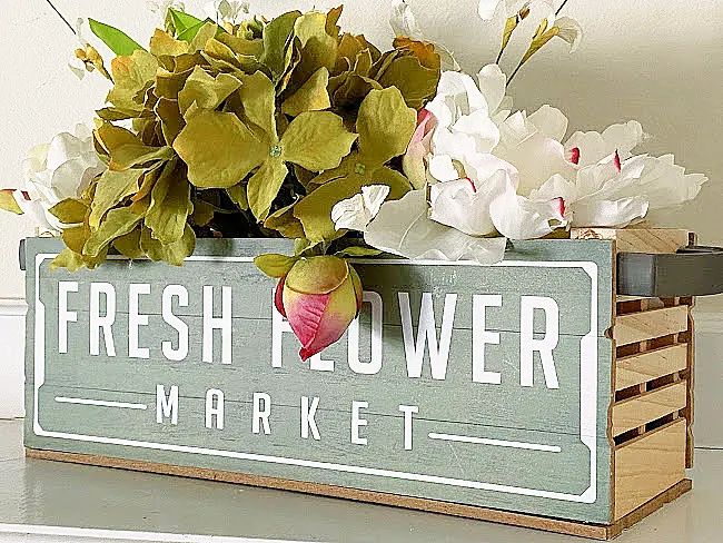 market crate filled wit faux flowers