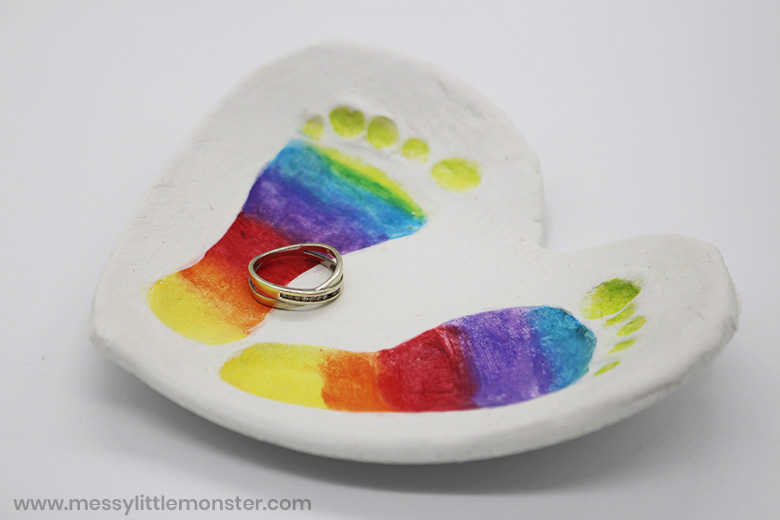 Clay Baby Footprint Art with rainbow footprints! Messy Little Monster