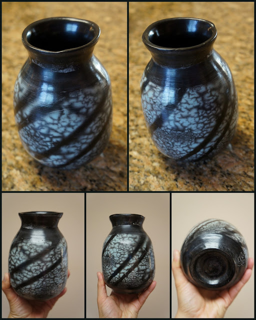 Beautiful striped naked raku pottery vessel / vase / ceramic pot.