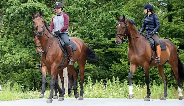 Crown Princess Mary and Crown Prince Frederik of Denmark at Gråsten Palace on horseback